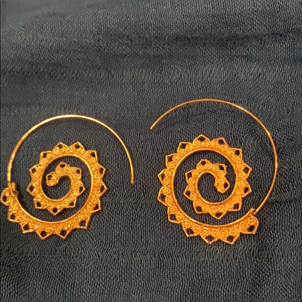 Gold toned swirl earrings